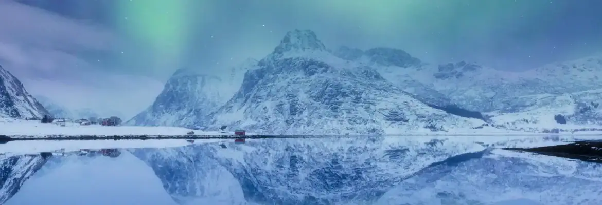 norway_lofoten-islands_aurora-borealis-over-hamnoy_francesco-riccardo-iacomino_gettyimages_1293292515