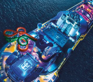 LB, Liberty of the Seas, exterior, aerial of ship at night, overhead view showing ship features from above, FlowRider, Tidal Wave, basketball court, onboard surfing, Rock Wall,  Perfect storm, water slides,