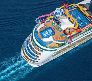 NV, Navigator of the Seas, OOH March 2019 shoot, aerial of ship, upper deck, slides, Flow Rider, basketball court, wake behind shipEXPIRATION DATE: March 1, 2024
